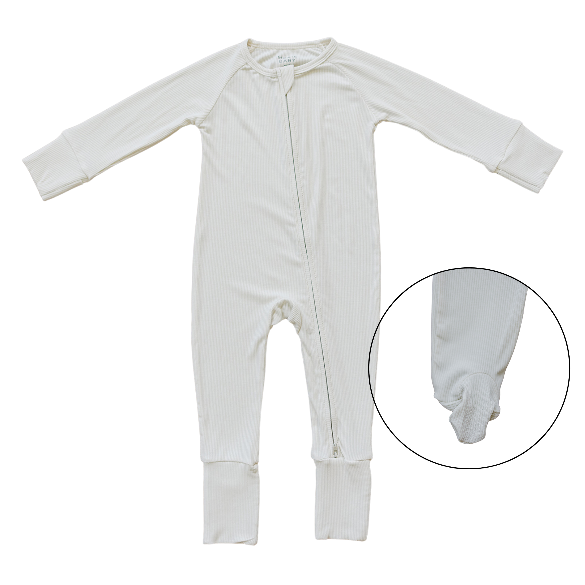 Cream ribbed bamboo zipper footie for babies, featuring a double zipper and fold-over feet for comfort.