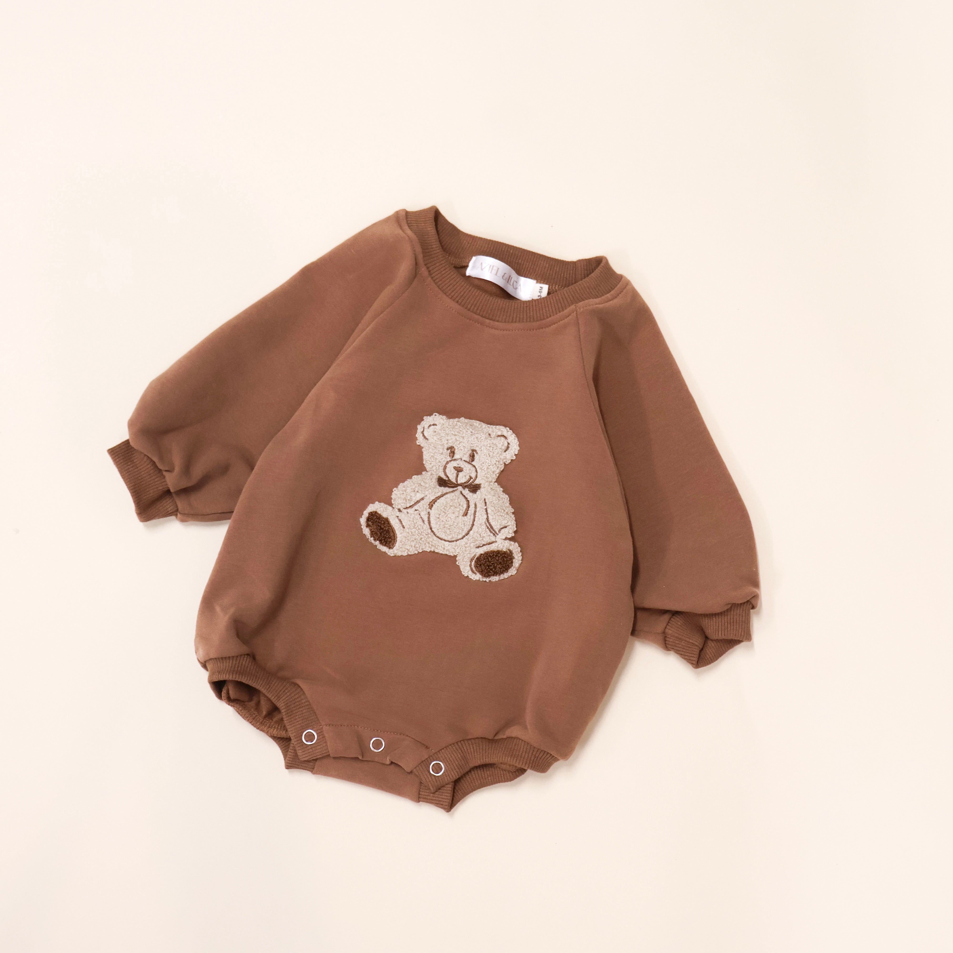 Bear Bubble Romper in brown French terry with teddy bear embroidery, perfect for toddlers.