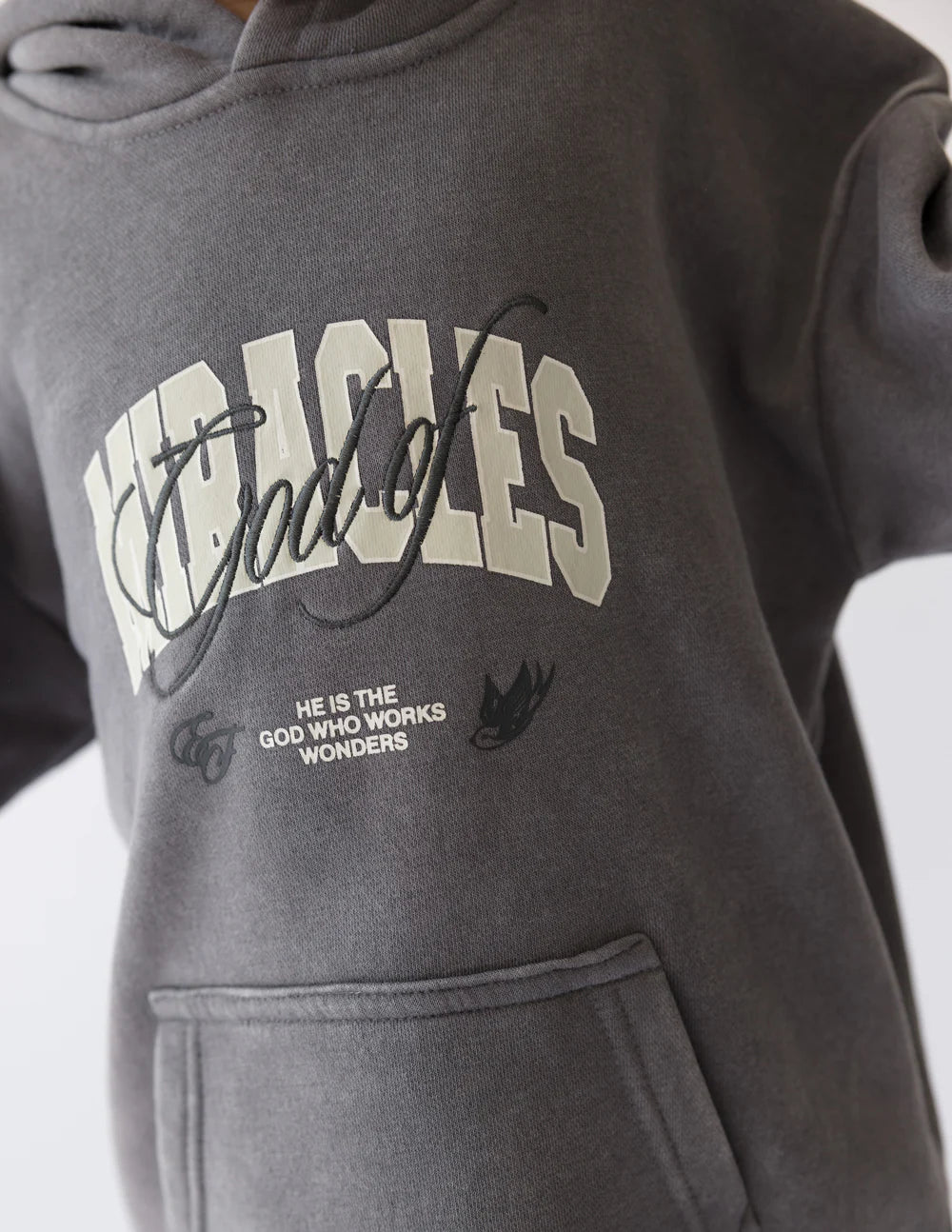 God of Miracles kids hoodie featuring stylish embroidery and cozy, oversized fit.