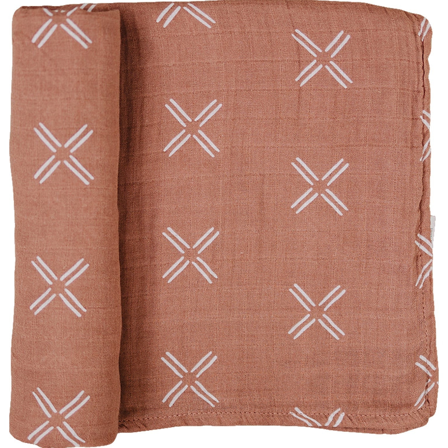 Muslin Swaddle Blanket in Just Peachy color with white geometric pattern, 100% breathable cotton, perfect for swaddling and nursing.