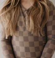 Faded brown checkerboard bamboo pajamas for kids, featuring a cozy long-sleeve top and trendy print.