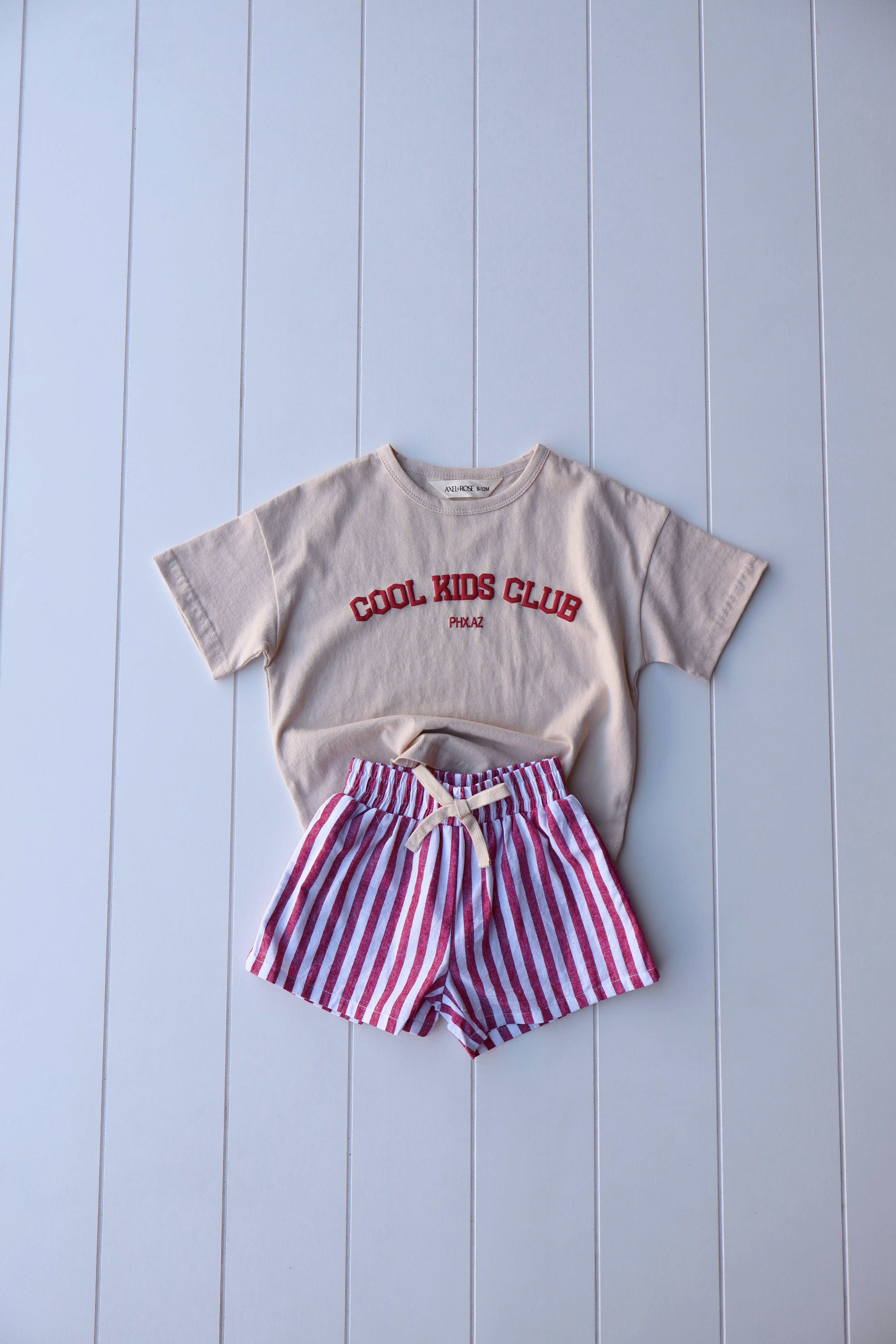 Vintage stripe shorts paired with a 'Cool Kids Club' graphic tee for toddlers and little kids.