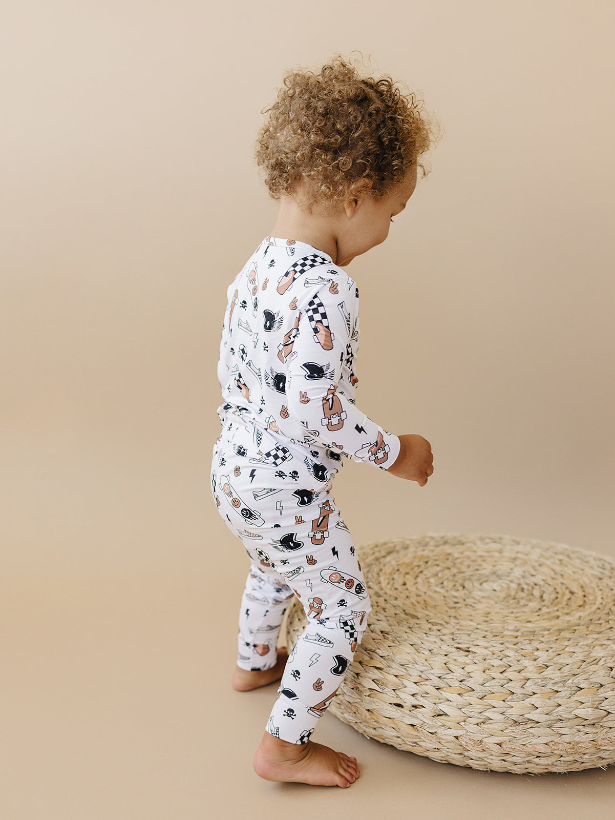 Child wearing the Bamboo Two Piece Set Sk8er, featuring playful graphics and ultra-soft comfort.