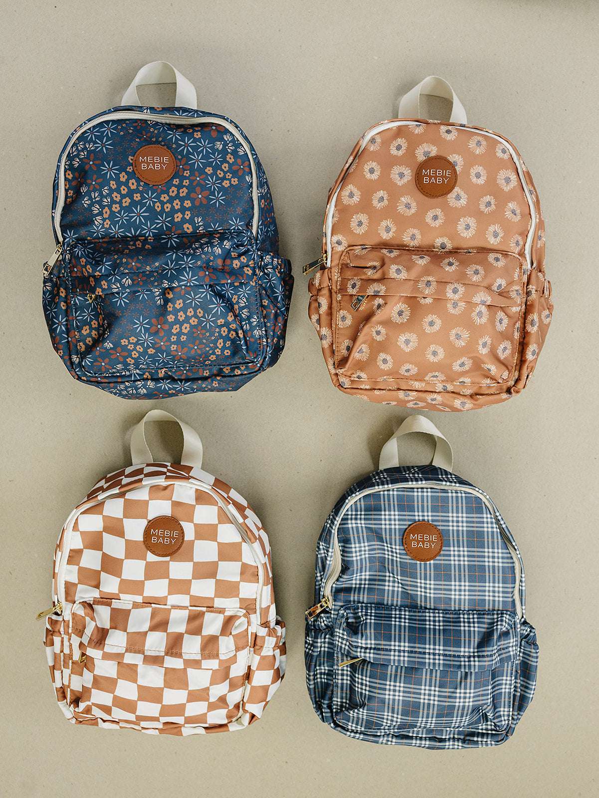 Colorful kids mini backpacks in various patterns, perfect for preschool and adventures.