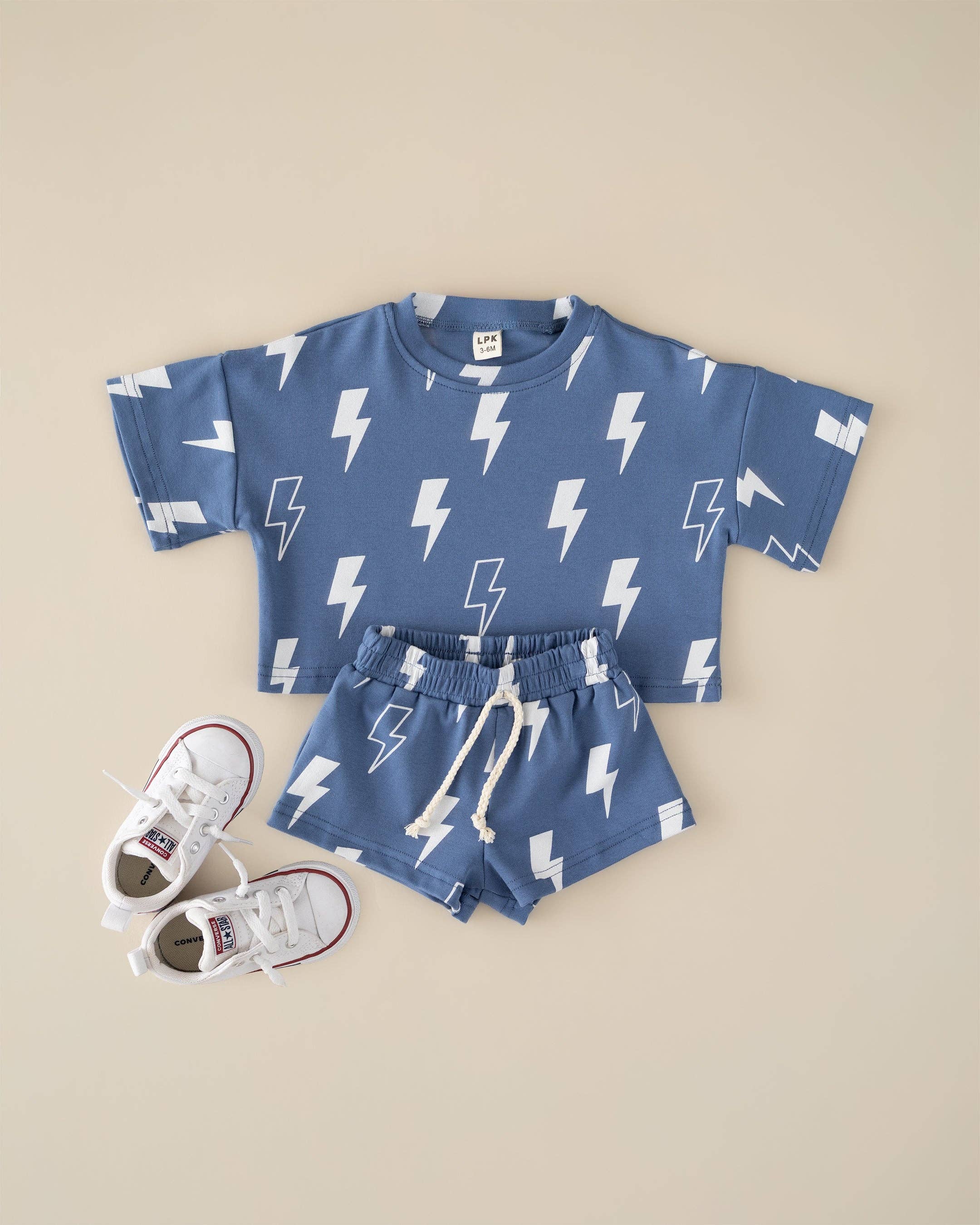 Blue Bolts toddler shorts set featuring a lightning bolt print tee and matching shorts with white sneakers.