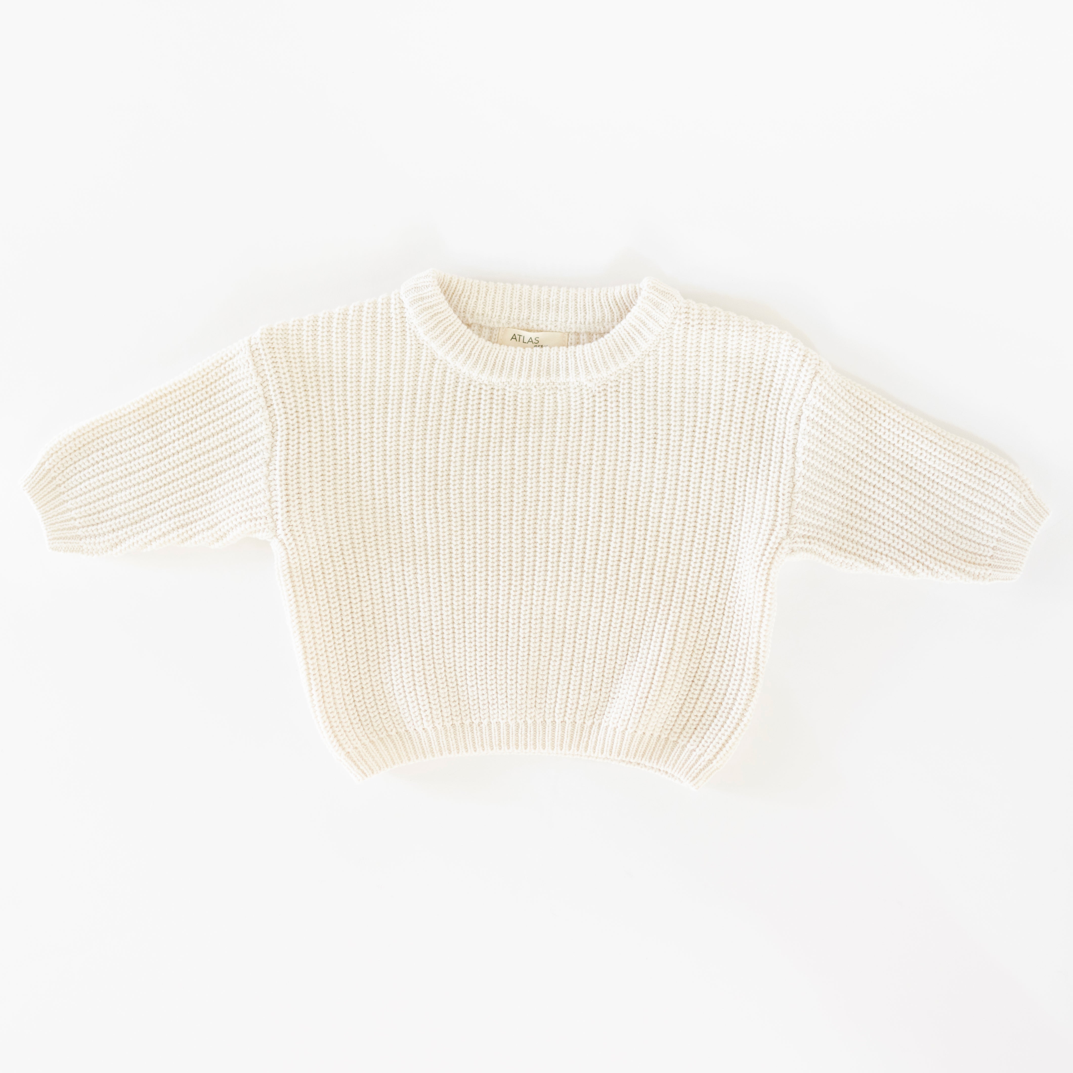 Organic Chunky Knit Sweater in soft Linen color, designed for comfort and style for babies and kids.