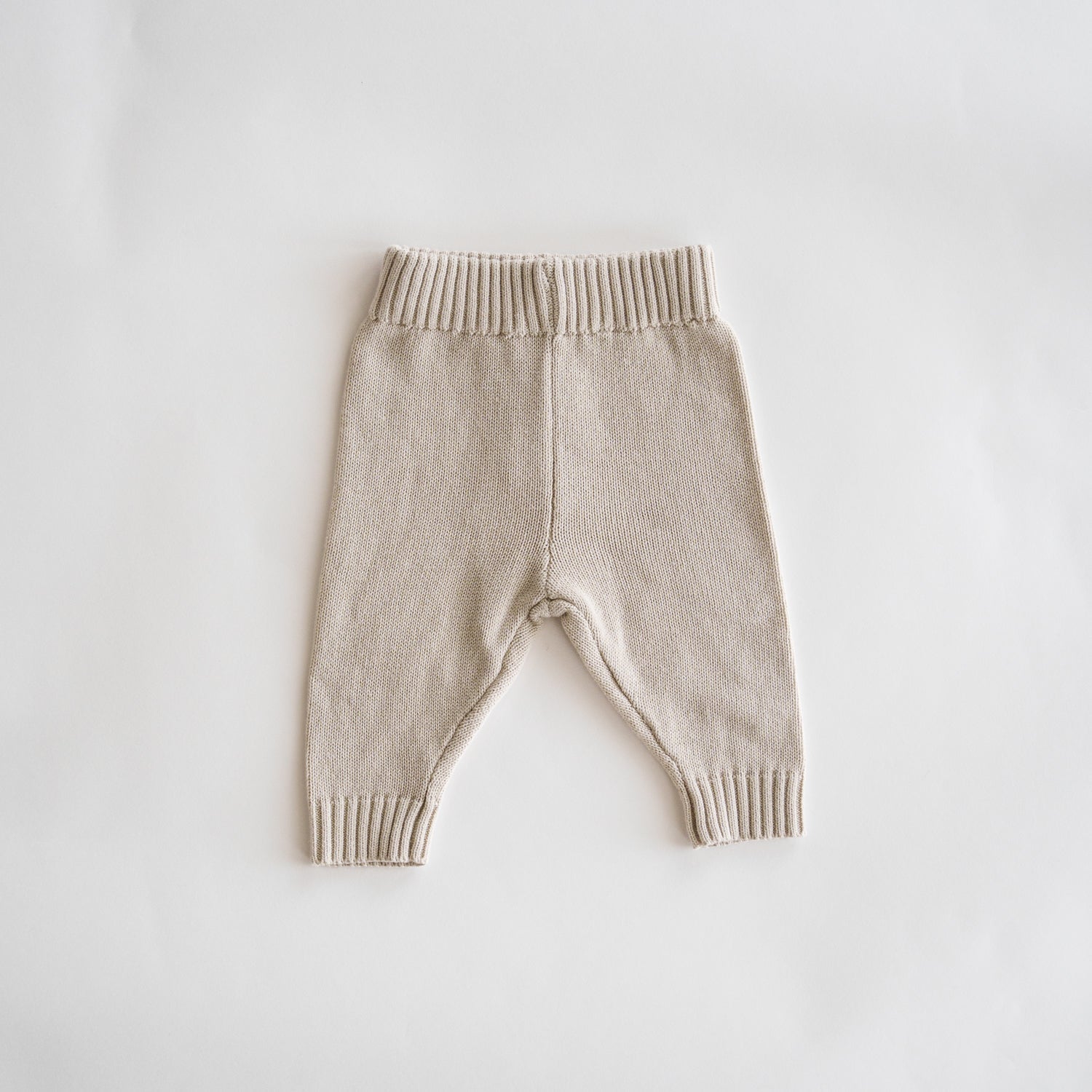 Organic Knit Oversized Pant - Cotton Baby Bottoms in neutral Ecru color with ribbed waistband and cuffs.