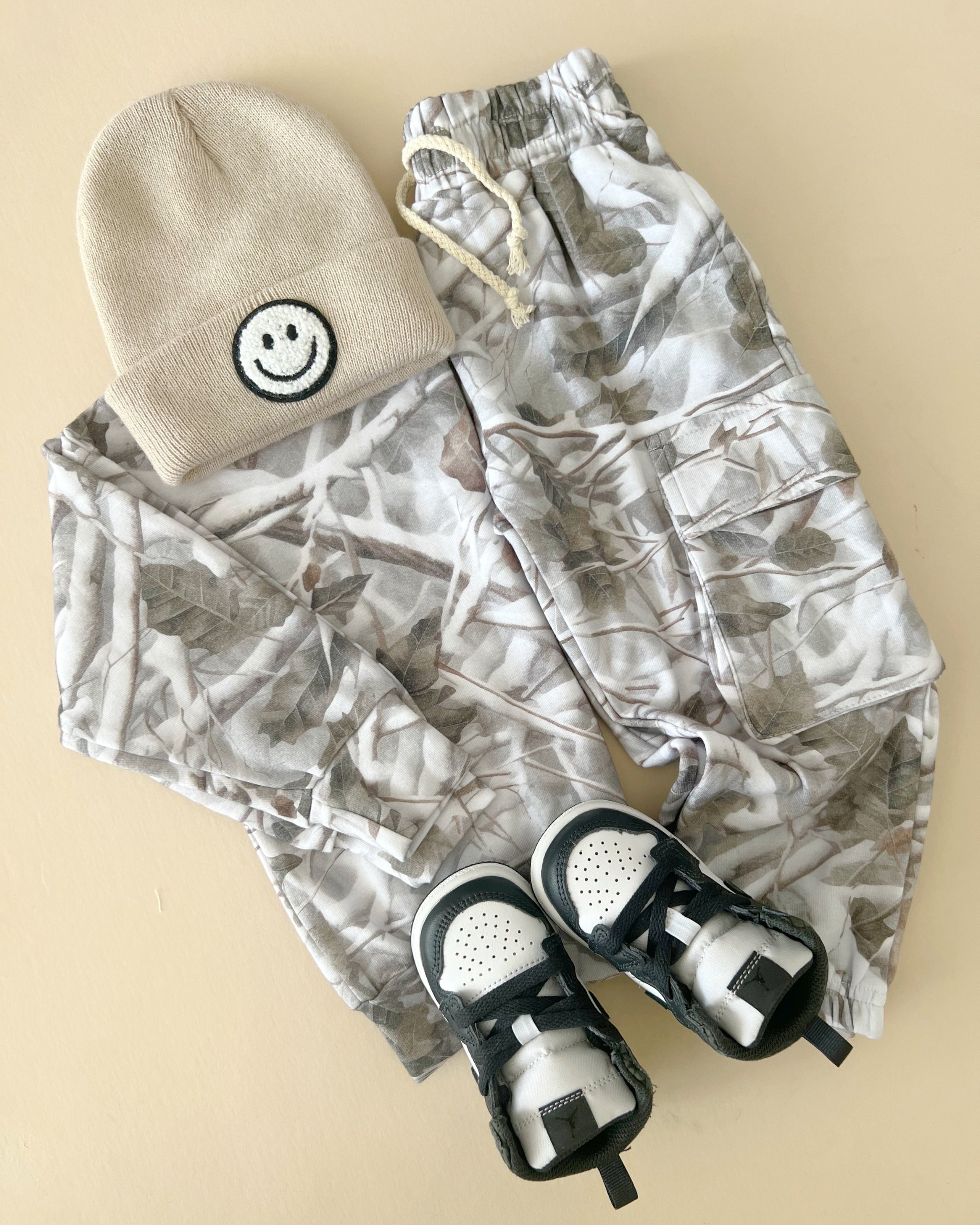 Camo kids lounge set with cargo joggers, matching hoodie and shoes, stylish outfit for kids.