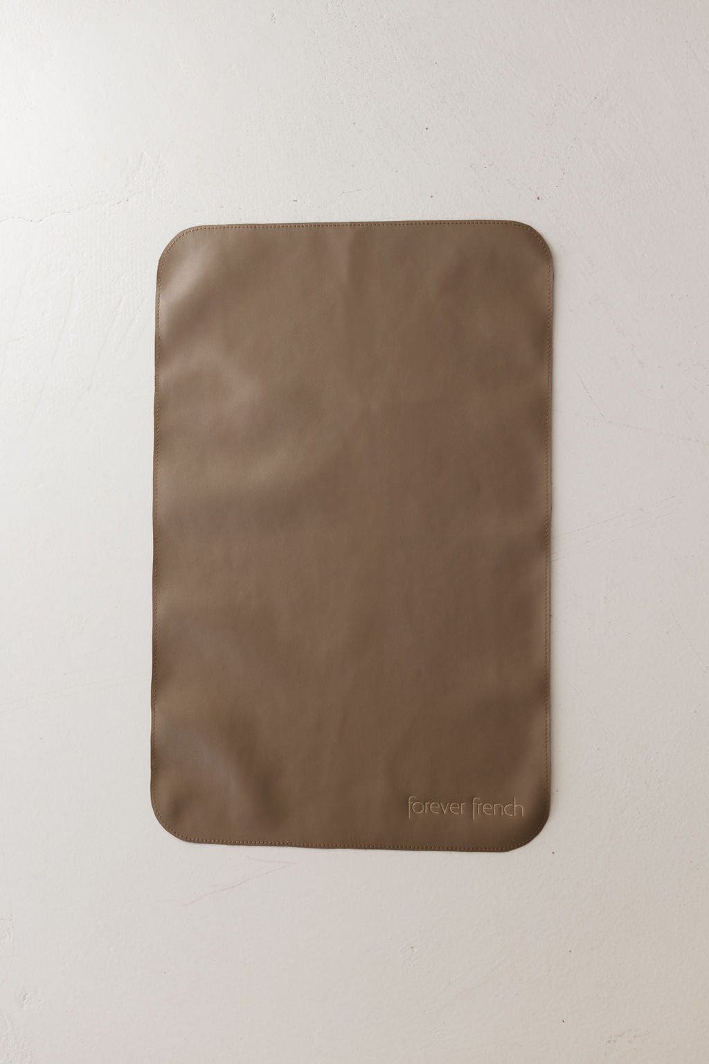 Vegan leather changing mat in taupe for ff Diaper Bag Taupe, practical and stylish for on-the-go parents.