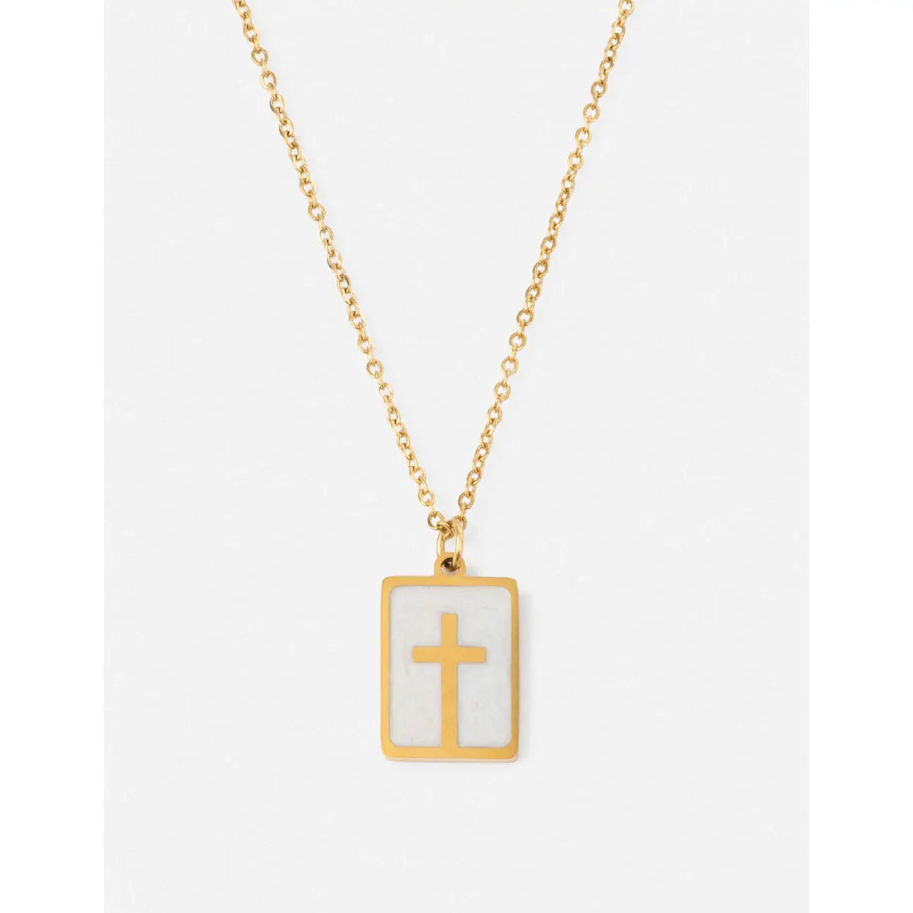Enamel cross necklace for women, featuring a minimalist design with a gold chain and cross pendant.