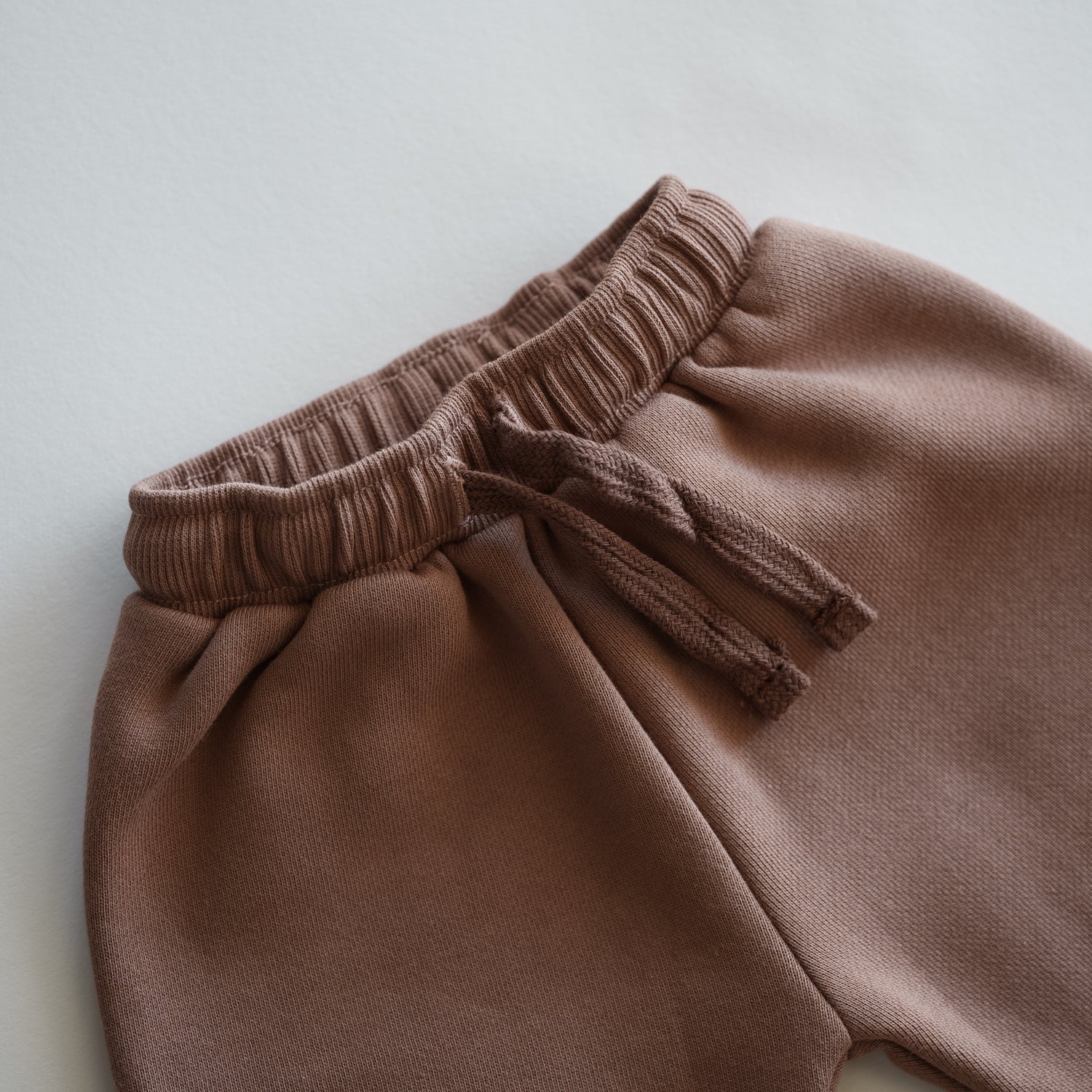 Oversized Sweatpant close-up of waistband and drawstring in cozy neutral fabric
