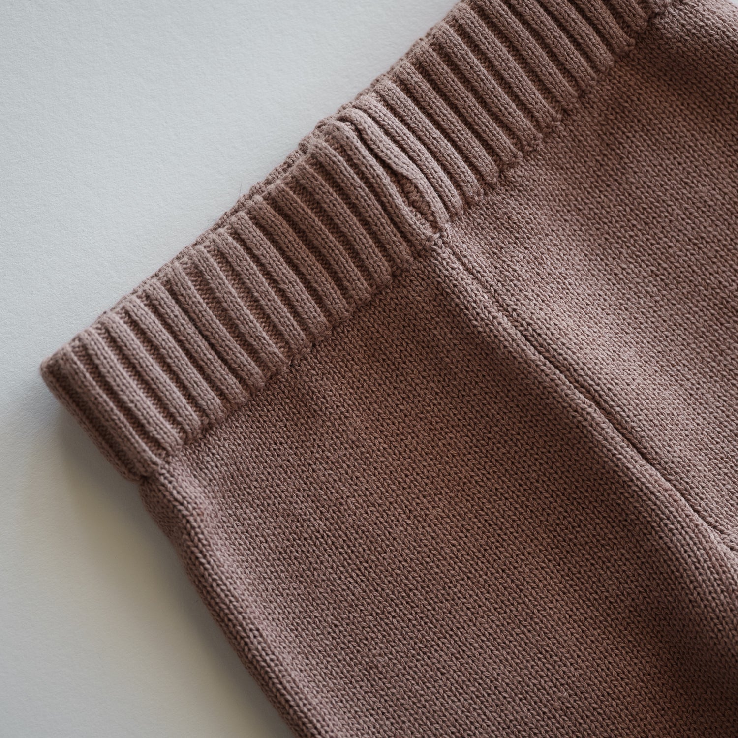 Close-up of the waistband of Organic Knit Oversized Pant in Brownie, showcasing soft, organic cotton knit.