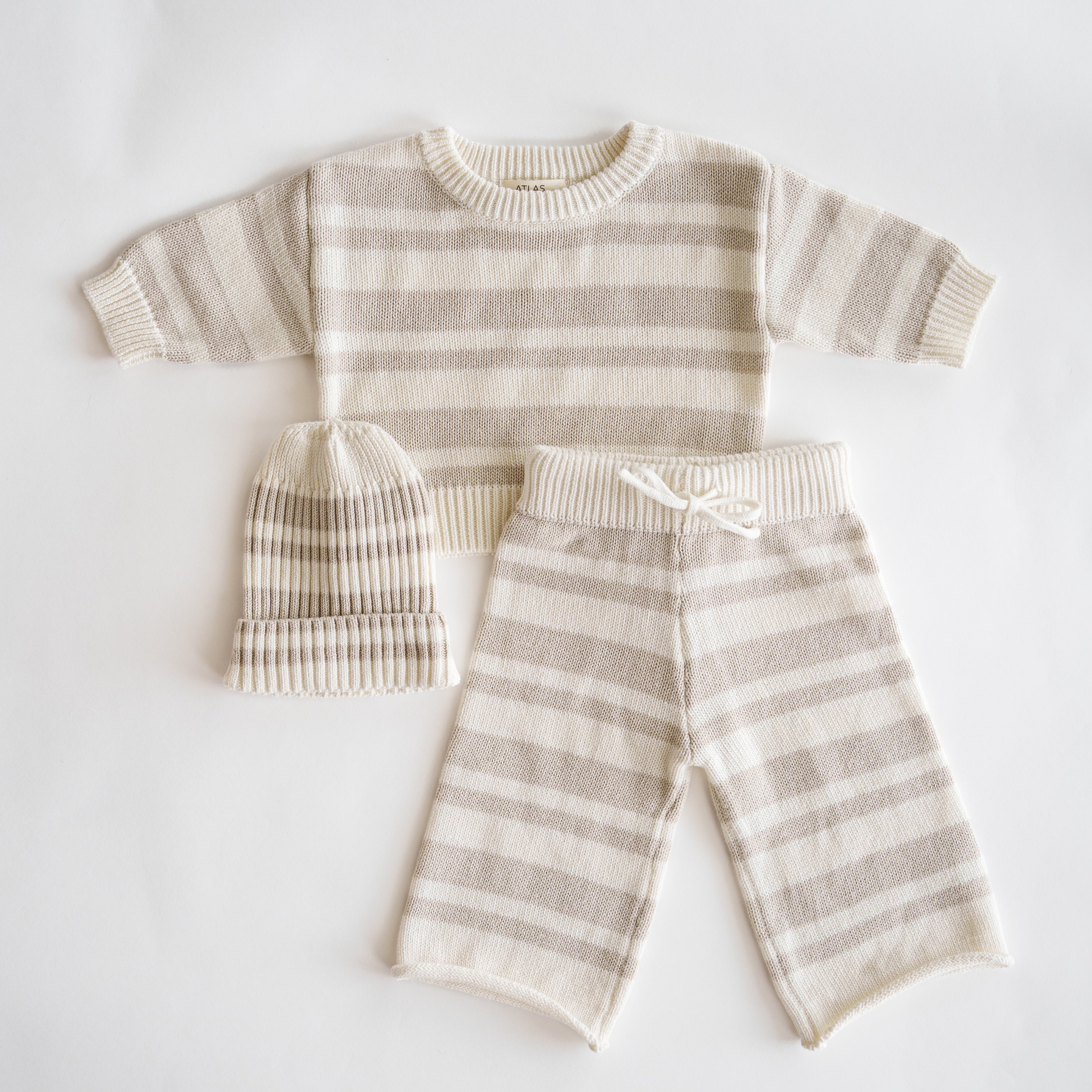 Organic Knit Wideleg Pant with matching sweater and hat in soft earthy tones for babies and toddlers.