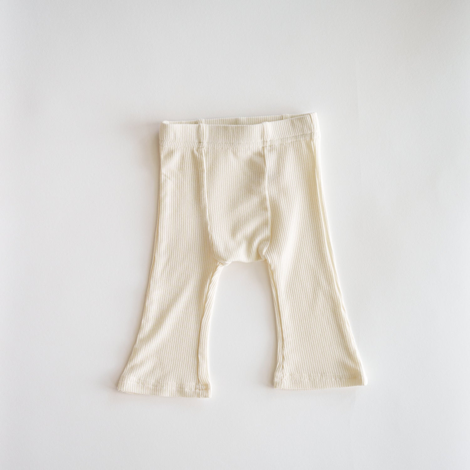 Ribbed Modal Flare Pant - Stretchy Neutral Flare Bottoms in a soft ribbed texture, ideal for everyday wear.