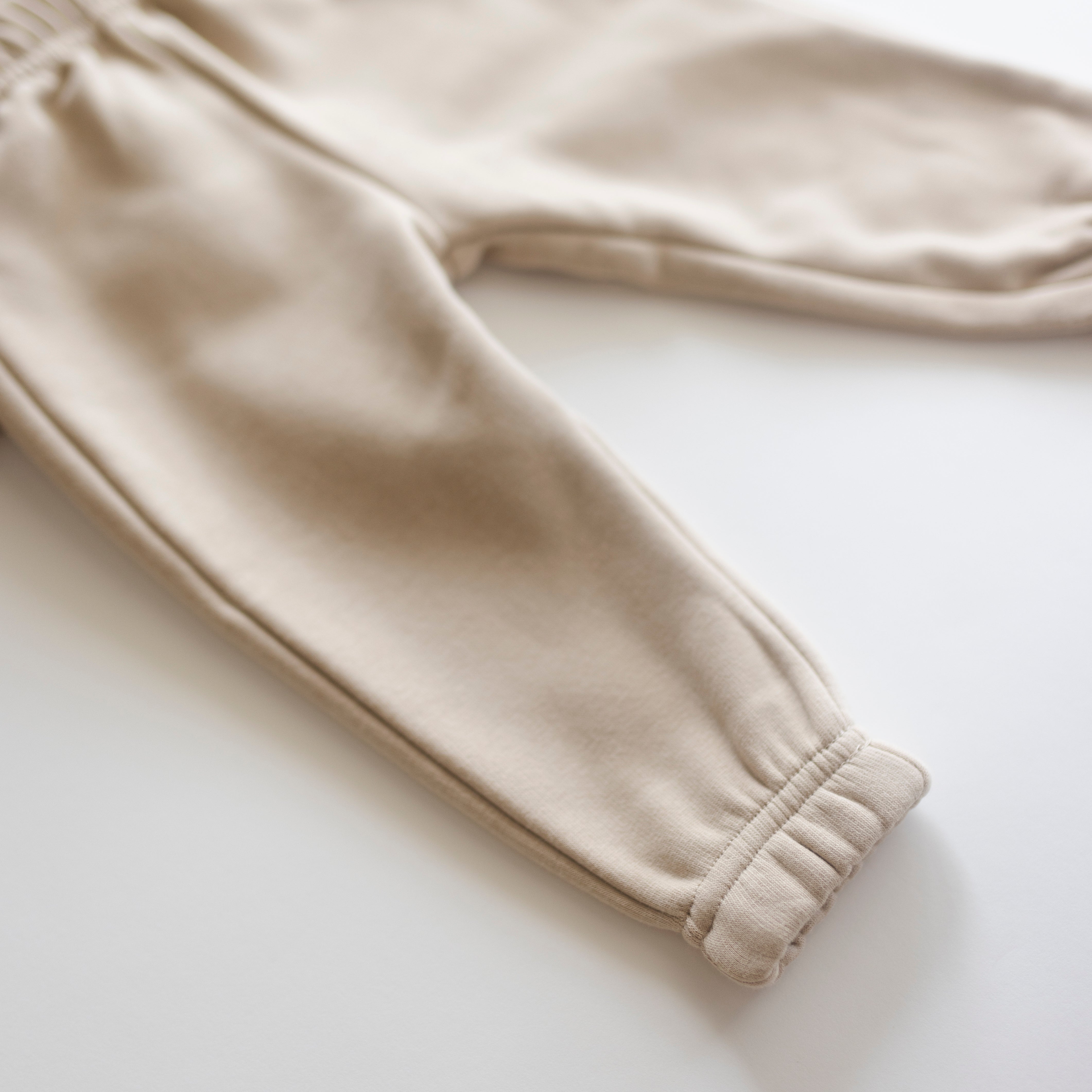 Fleece Sweat Set - Ultra-Soft Neutral Lounge Set beige elastic cuff pants detail on white background