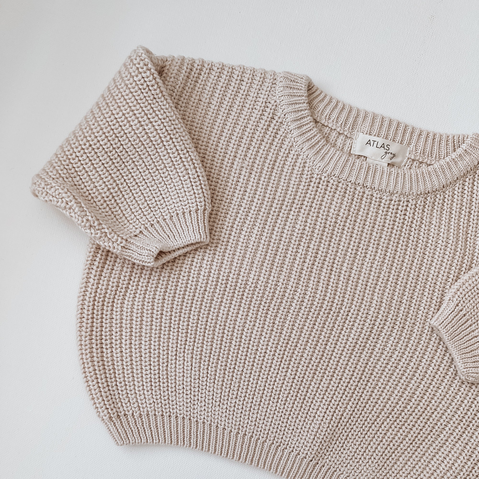 Organic Chunky Knit Sweater - Baby & Kids in soft beige color, showcasing texture and style.