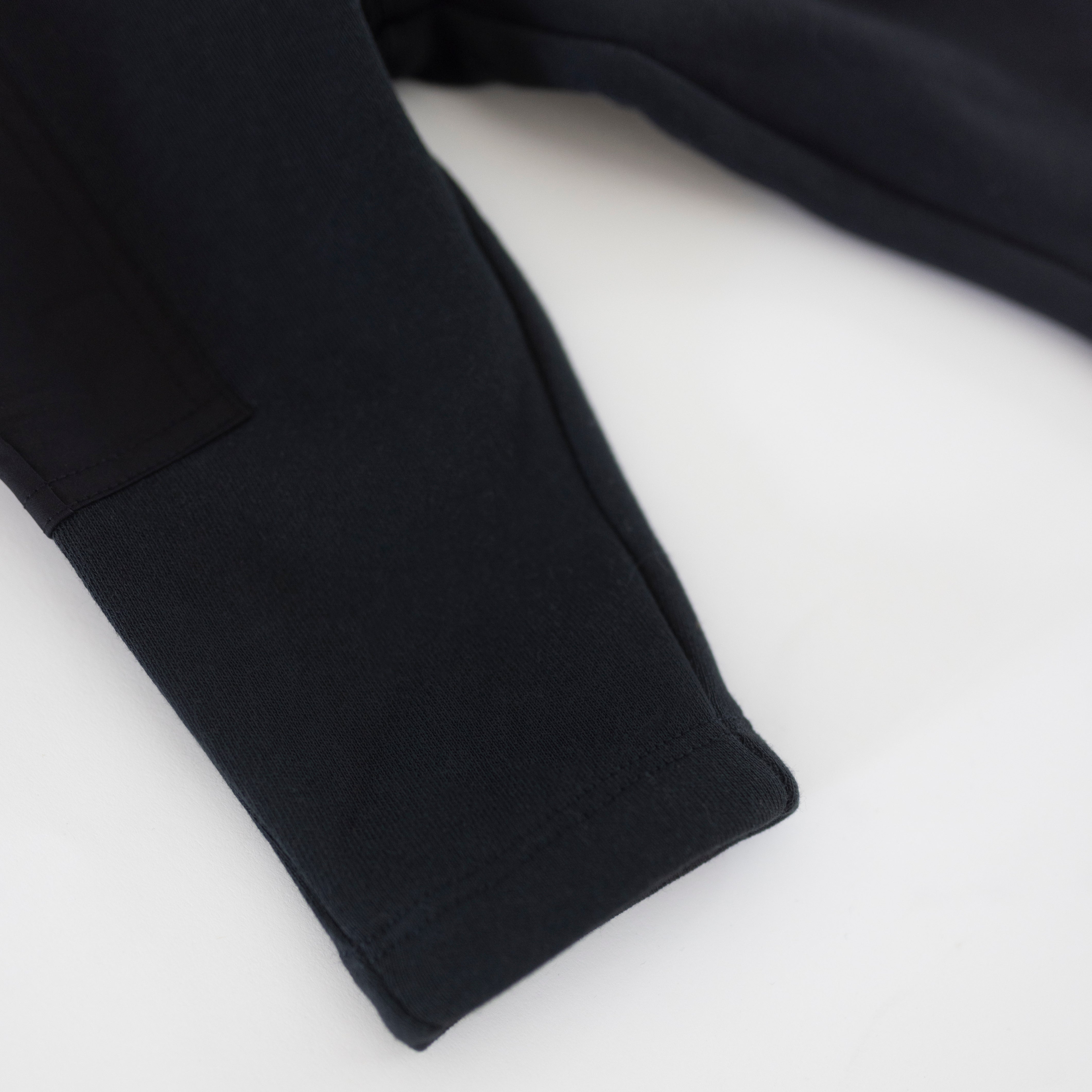 Close-up of Cargo Wideleg Pant showing the soft fabric and wideleg design in neutral color.