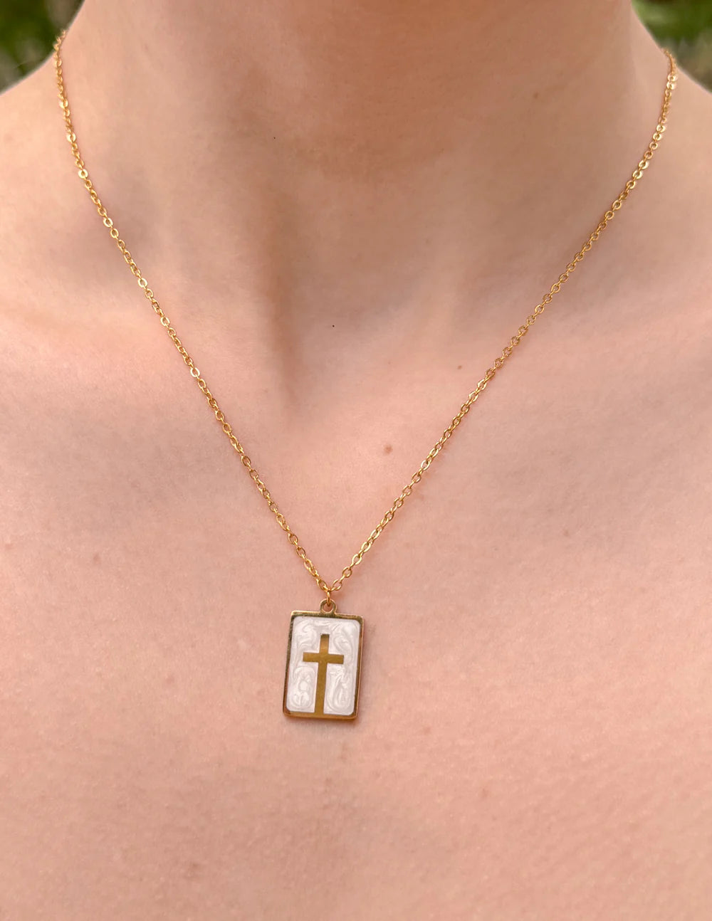 Minimalist enamel cross necklace for women, gold chain with a chic pendant, perfect for daily wear or special occasions.