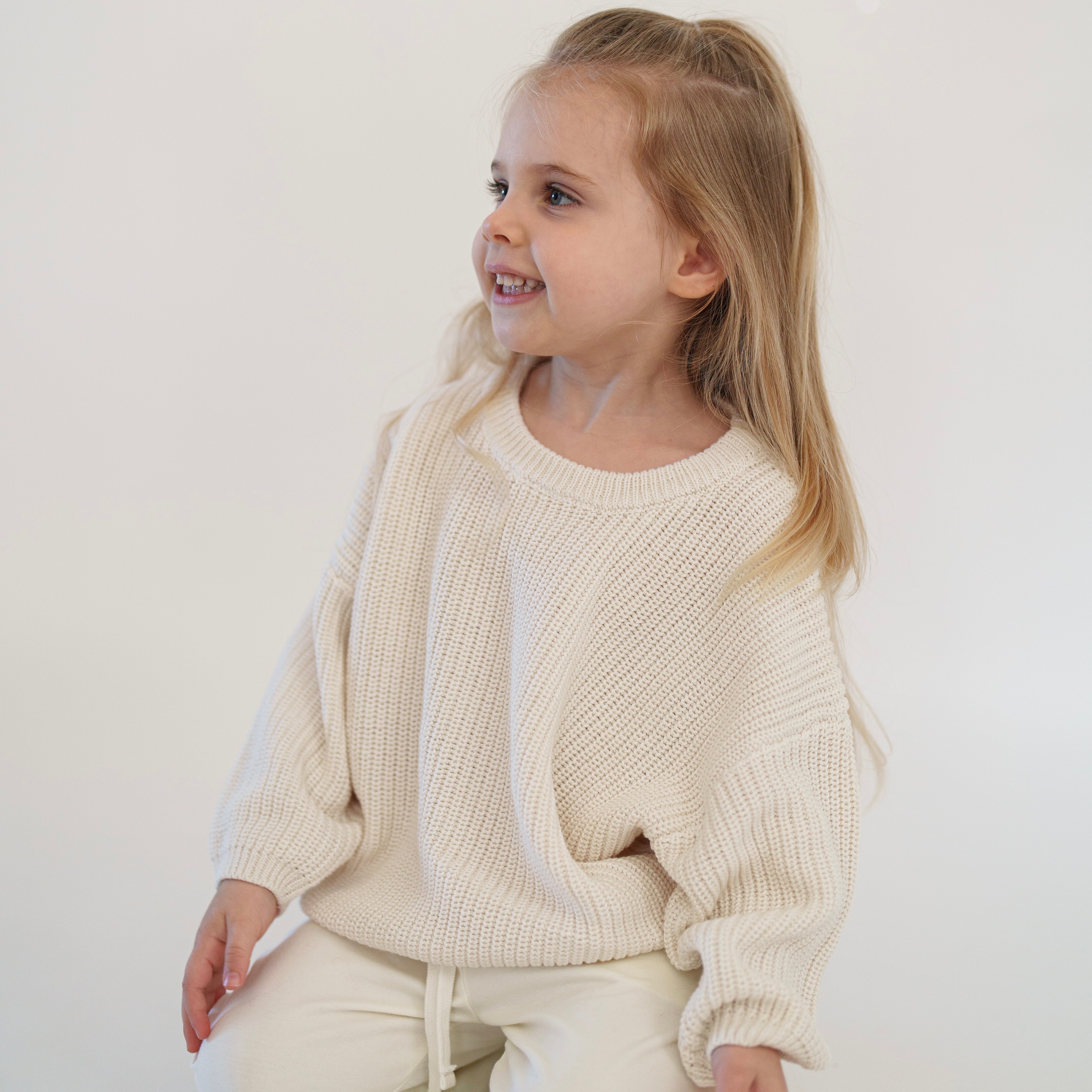Organic Chunky Knit Sweater for kids in soft linen color, designed for comfort and style.