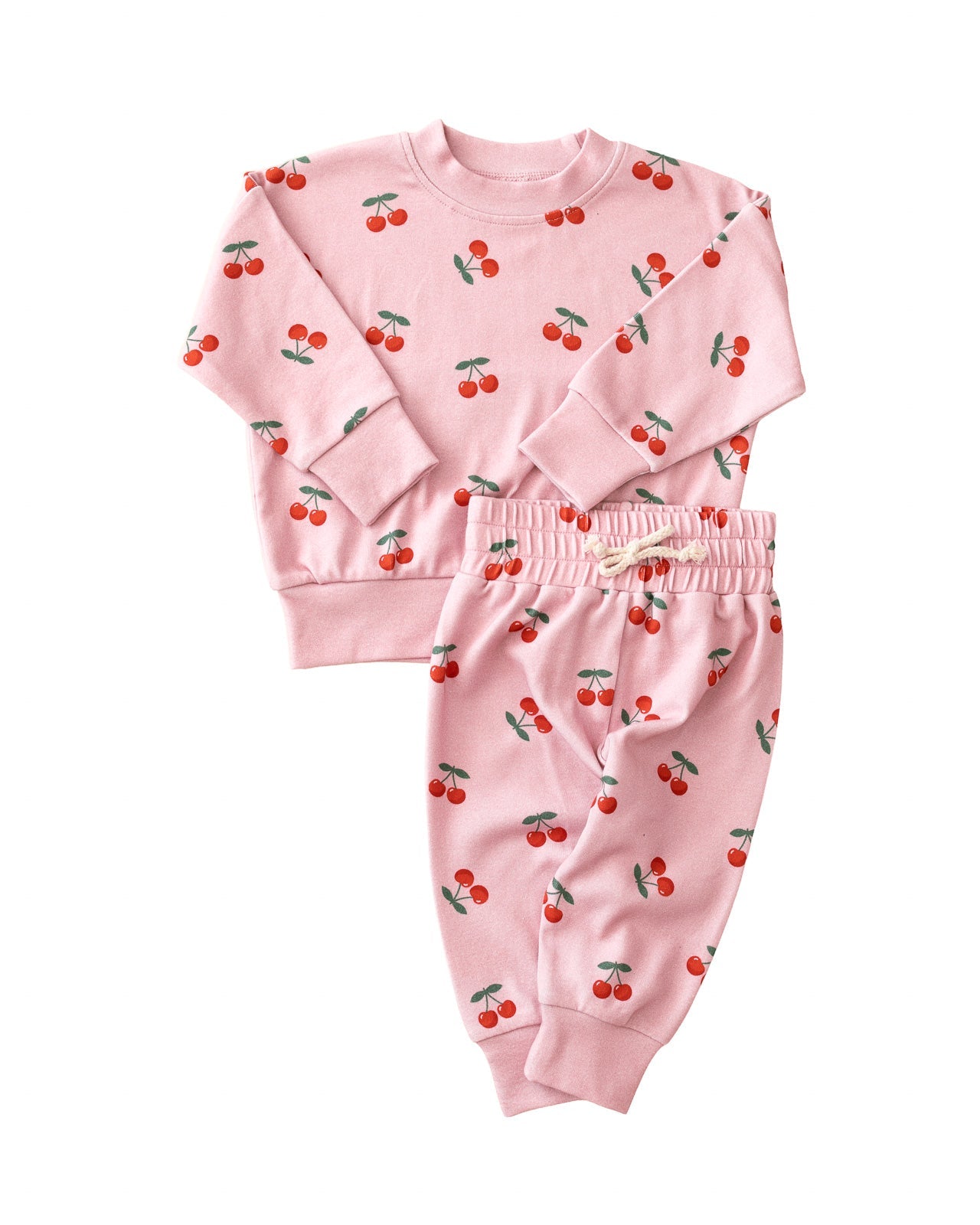 Blush Cherry Kids Lounge Set - Baby & Toddler Outfit featuring a pink cherry print top and jogger-style bottoms.