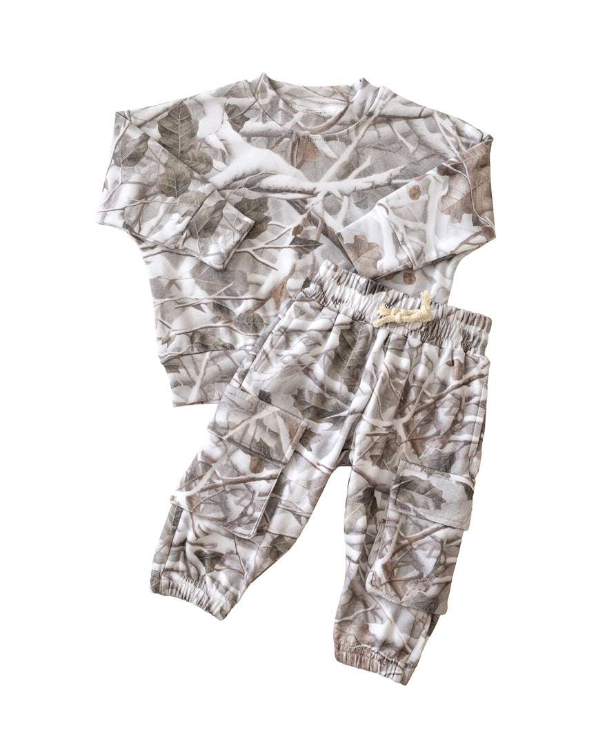 Camo kids lounge set with cargo joggers featuring a soft pullover hoodie and matching pants in camo print.