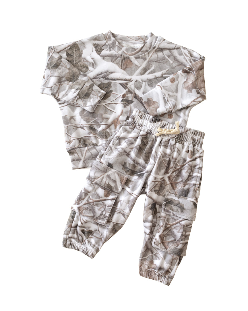 Camo kids lounge set with cargo joggers featuring a soft pullover hoodie and matching pants in camo print.