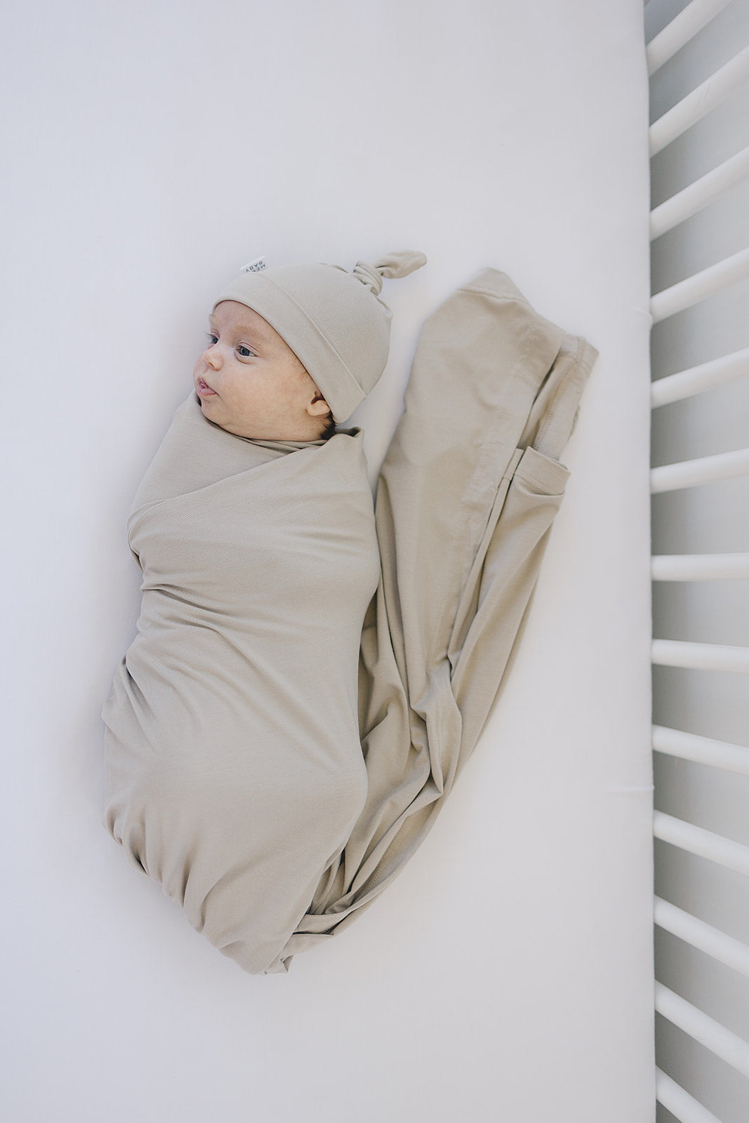 Bamboo Stretch Swaddle Oatmeal, soft and neutral baby wrap for newborns.