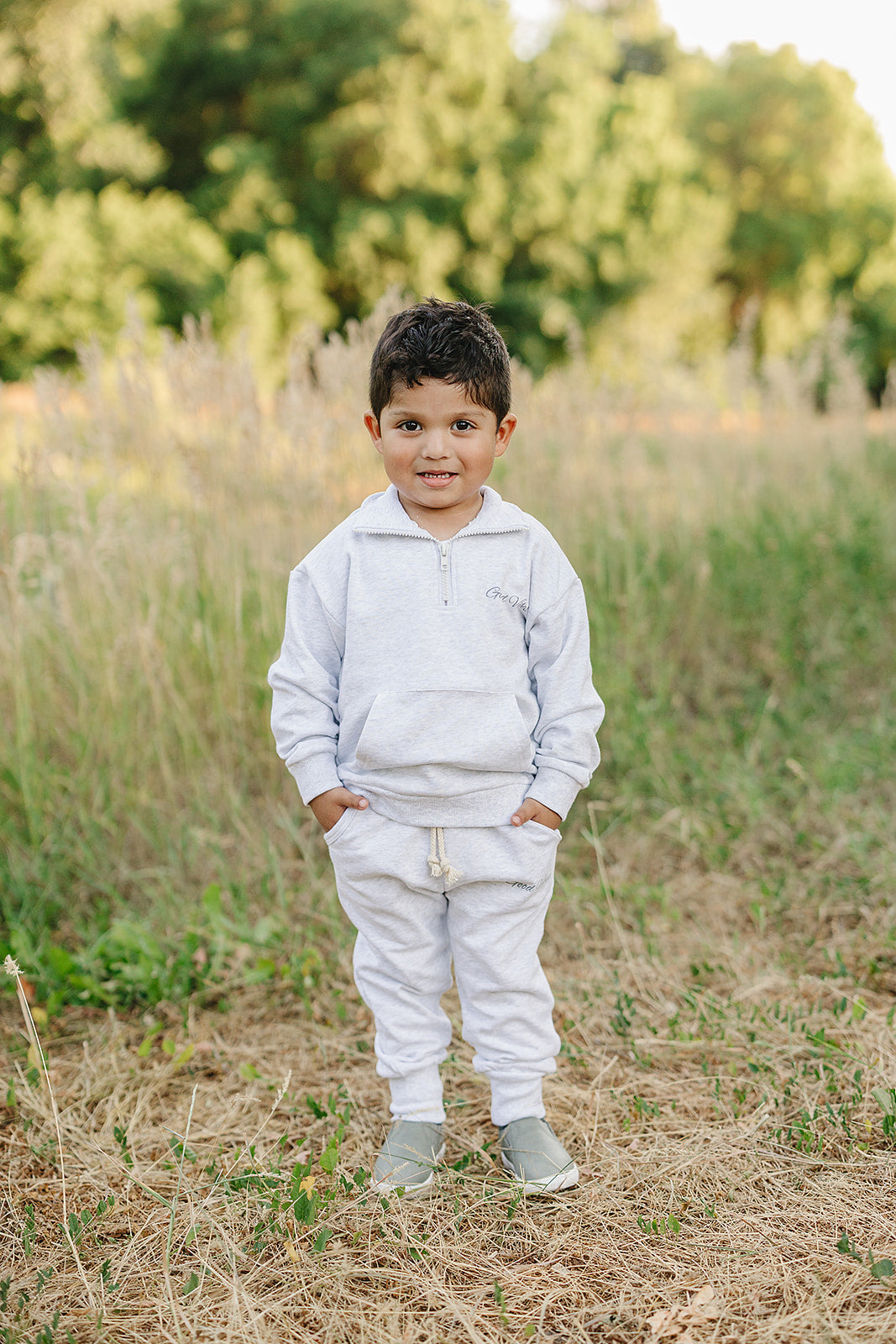 Unisex French terry school outfit for kids featuring a quarter zip sweatshirt and joggers, perfect for active little ones.