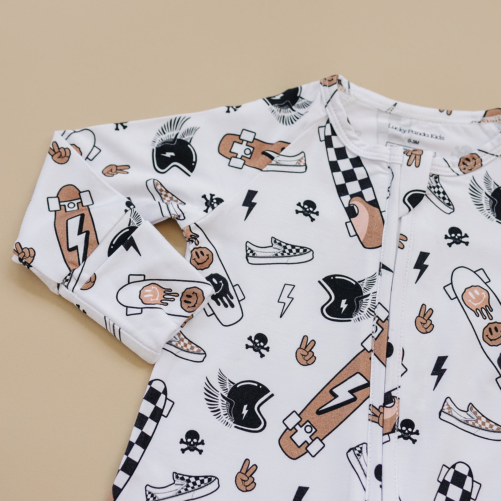Bamboo Zip Romper Sk8er featuring skateboards, kicks, and graffiti-style prints on ultra-soft fabric.