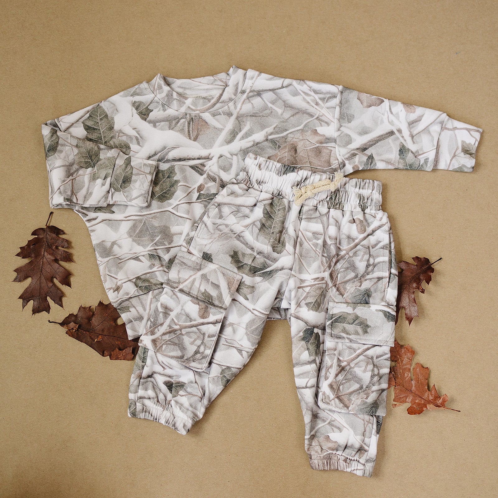 Camo kids lounge set with cargo joggers in a stylish camo print, perfect for comfort and everyday play.