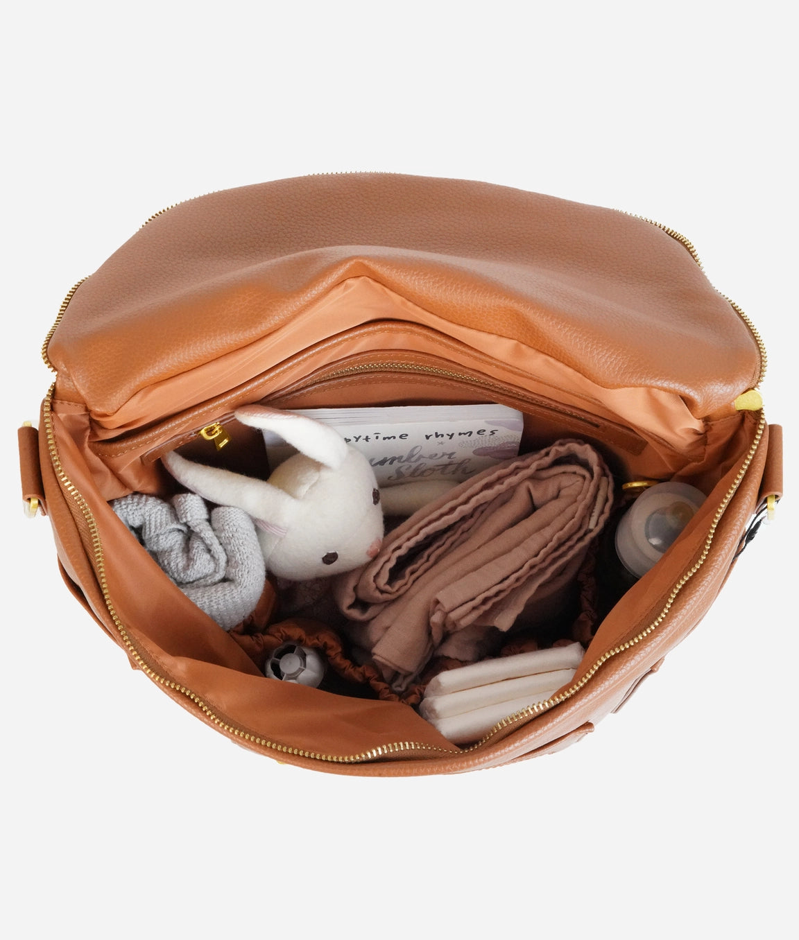 Interior view of the Original Diaper Bag Backpack showcasing organized baby essentials.