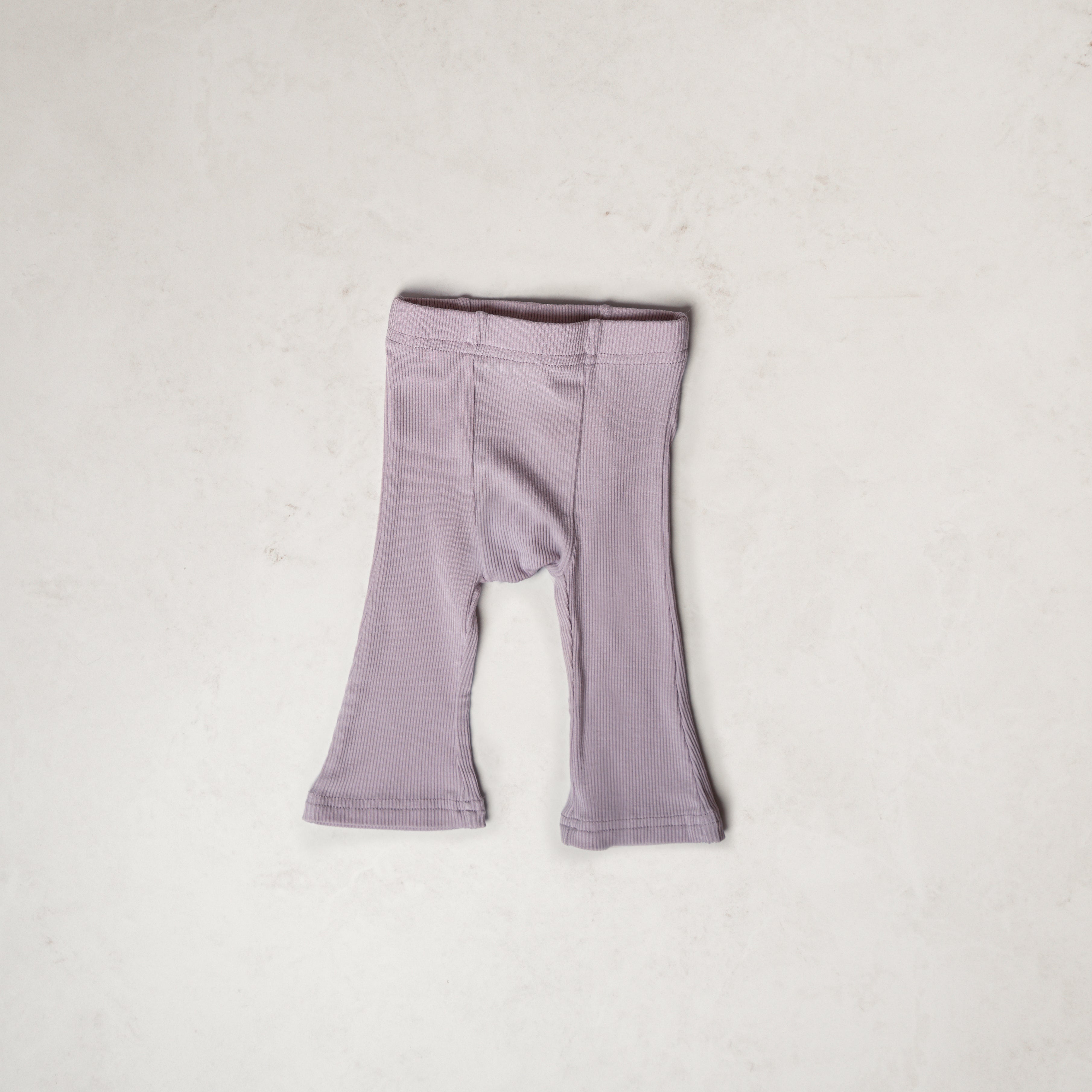 Ribbed Modal Flare Pant in light purple, featuring a soft ribbed texture and a stylish flare fit.