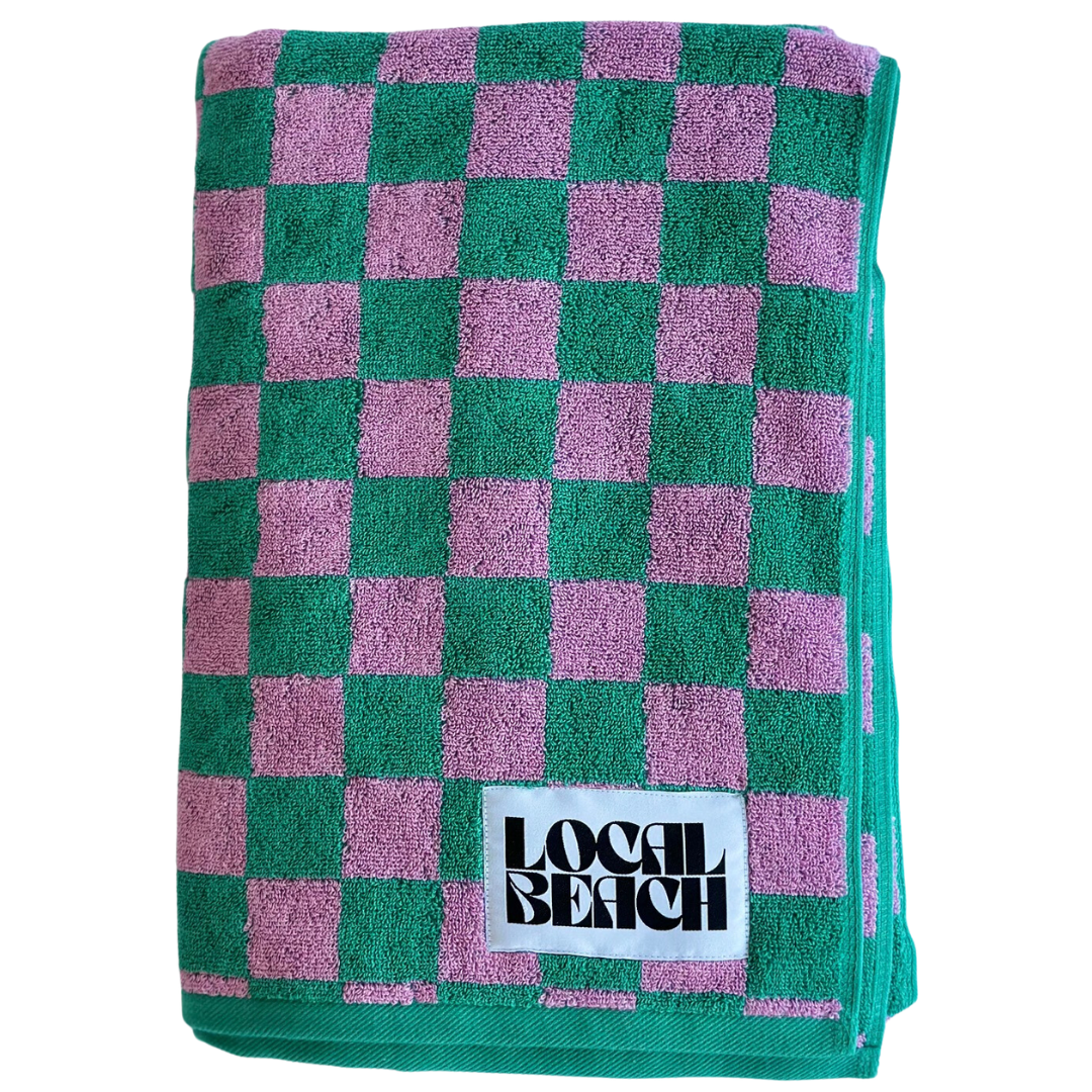 Oversized green and pink checker beach towel with Local Beach logo, ideal for pool, bath, or beach use.