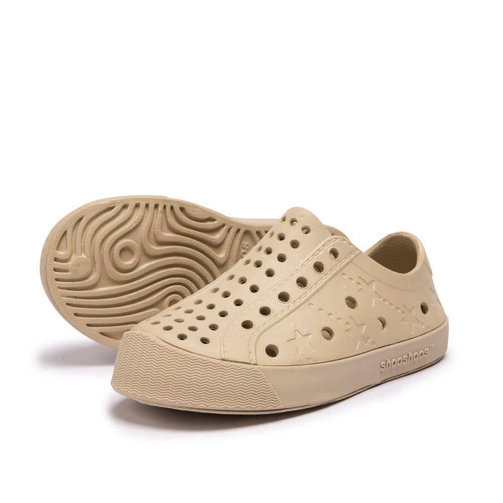 Tucson Shooshoos waterproof toddler sneakers in beige, featuring breathable design and flexible sole for active kids.